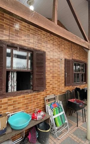 Casa à venda com 80m², 3 quartos e 2 vagas Casa à venda com 80m², 3 quartos e 2 vagasÁrea externa