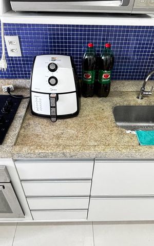 Apartamento para alugar com 50m², 2 quartos e 1 vaga Apartamento para alugar com 50m², 2 quartos e 1 vagaCozinha e Área de Serviço