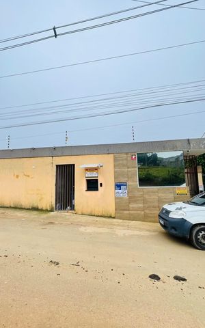 Casa de condomínio para alugar com 47m², 2 quartos e 2 vagas Casa de condomínio para alugar com 47m², 2 quartos e 2 vagasFachada com a placa