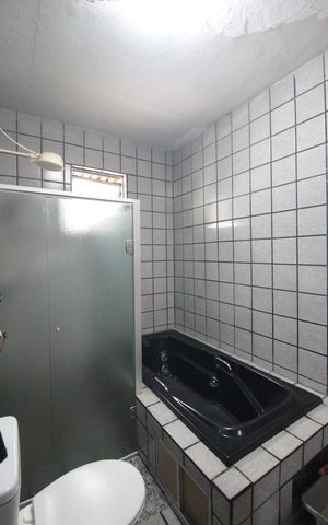 Casa para alugar com 360m², 4 quartos e 5 vagasBanheiro da Suite