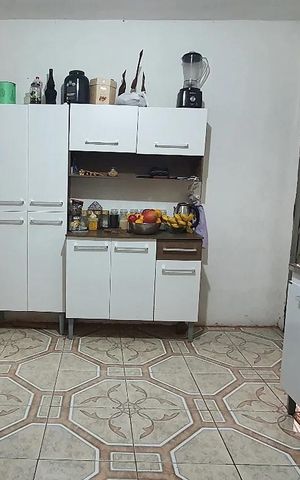 Casa à venda com 72m², 3 quartos e 4 vagas Casa à venda com 72m², 3 quartos e 4 vagasCozinha