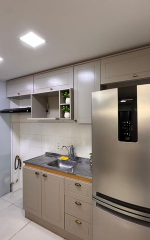 Apartamento à venda com 58m², 2 quartos e 1 vaga Apartamento à venda com 58m², 2 quartos e 1 vagaCozinha e Área de Serviço