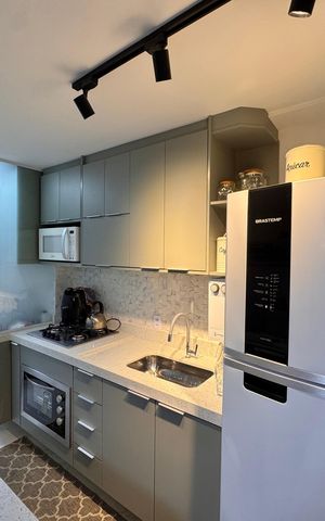 Apartamento à venda com 66m², 2 quartos e 1 vaga Apartamento à venda com 66m², 2 quartos e 1 vagaCozinha e Área de Serviço