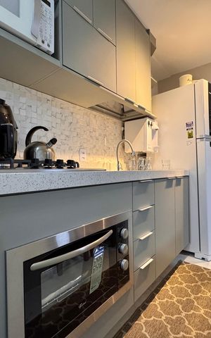 Apartamento à venda com 66m², 2 quartos e 1 vaga Apartamento à venda com 66m², 2 quartos e 1 vagaCozinha e Área de Serviço