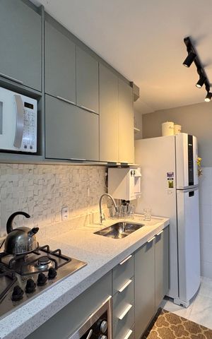 Apartamento à venda com 66m², 2 quartos e 1 vaga Apartamento à venda com 66m², 2 quartos e 1 vagaCozinha e Área de Serviço