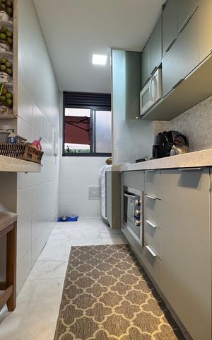 Apartamento à venda com 66m², 2 quartos e 1 vaga Apartamento à venda com 66m², 2 quartos e 1 vagaCozinha e Área de Serviço