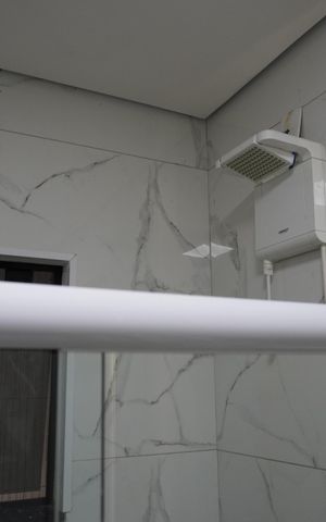 Casa à venda com 173m², 2 quartos e 2 vagasBanheiro do Corredor