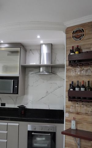 Casa à venda com 173m², 2 quartos e 2 vagasCozinha e Área de Serviço
