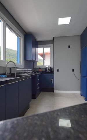 Casa de condomínio para alugar com 300m², 4 quartos e 2 vagasCozinha 