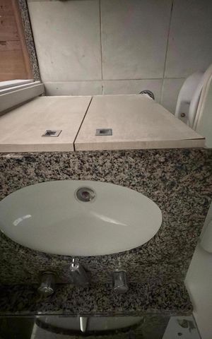 Apartamento à venda com 56m², 2 quartos e 1 vaga Apartamento à venda com 56m², 2 quartos e 1 vagaBanheiro Social