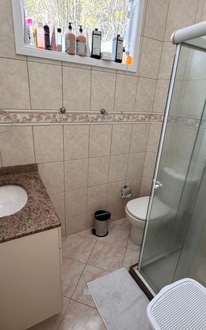 Casa de condomínio à venda com 358m², 4 quartos e 3 vagas Casa de condomínio à venda com 358m², 4 quartos e 3 vagasBanheiro