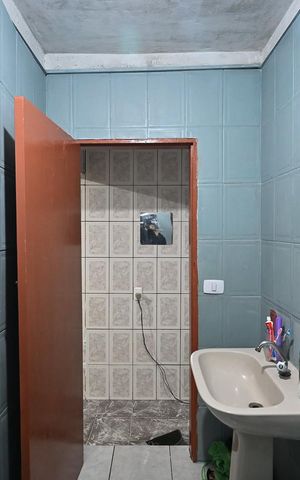 Casa à venda com 125m², 5 quartos e 2 vagasBanheiro Casa 1