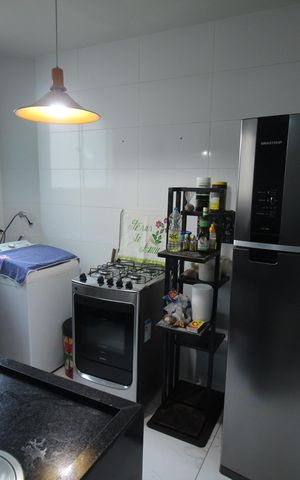 Apartamento à venda com 52m², 2 quartos e 1 vagaCozinha e Área de Serviço