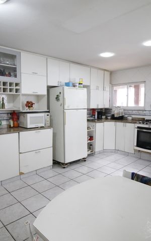 Casa de condomínio à venda com 300m², 6 quartos e 3 vagasCozinha