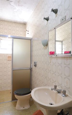 Casa à venda com 220m², 4 quartos e 4 vagasBanheiro