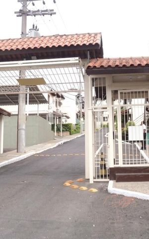 Casa de condomínio à venda com 79m², 3 quartos e 1 vaga Casa de condomínio à venda com 79m², 3 quartos e 1 vagaFachada