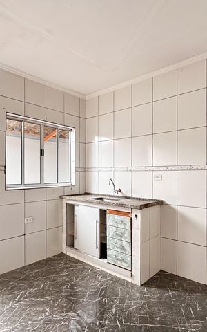 Casa à venda com 132m², 2 quartos e 2 vagas Casa à venda com 132m², 2 quartos e 2 vagasCozinha