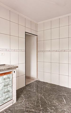 Casa à venda com 132m², 2 quartos e 2 vagas Casa à venda com 132m², 2 quartos e 2 vagasCozinha