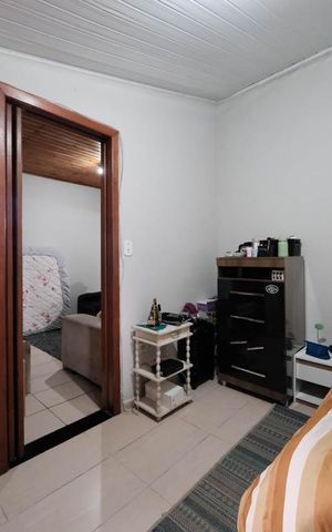 Casa à venda com 80m², 2 quartos e 2 vagasQuarto 1