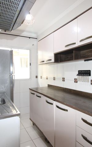 Casa de condomínio para alugar com 115m², 3 quartos e 2 vagasCozinha
