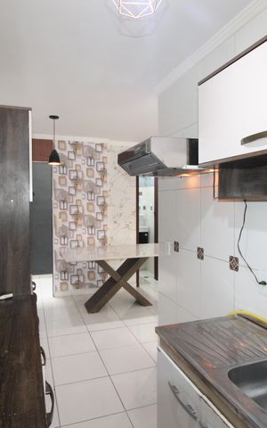 Casa de condomínio para alugar com 115m², 3 quartos e 2 vagasCozinha