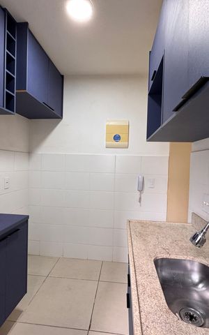 Apartamento à venda com 49m², 2 quartos e 1 vaga Apartamento à venda com 49m², 2 quartos e 1 vagaCozinha e Área de Serviço