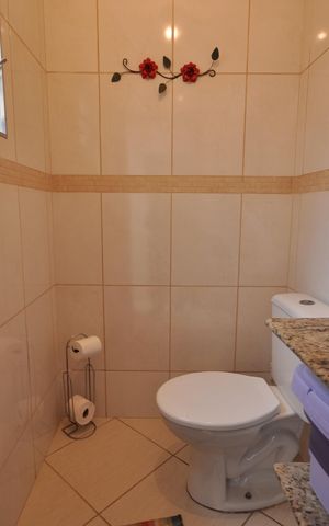 Casa à venda com 130m², 2 quartos e 2 vagasLavabo