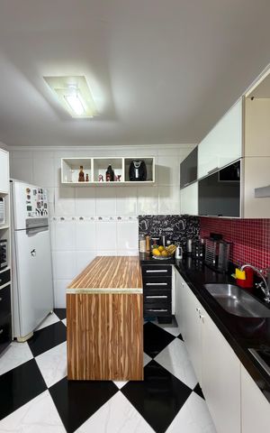 Apartamento à venda com 55m², 2 quartos e 1 vaga Apartamento à venda com 55m², 2 quartos e 1 vagaCozinha e Área de Serviço