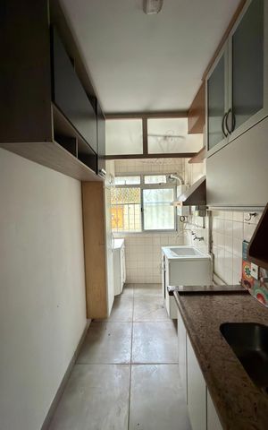 Apartamento à venda com 52m², 2 quartos e 1 vaga Apartamento à venda com 52m², 2 quartos e 1 vagaCozinha e Área de Serviço