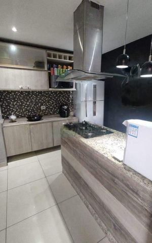 Casa à venda com 103m², 2 quartos e 2 vagas