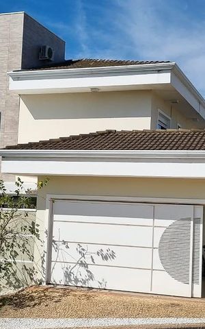 Casa de condomínio à venda com 415m², 4 quartos e 3 vagas Casa de condomínio à venda com 415m², 4 quartos e 3 vagasFachada