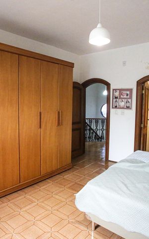 Casa à venda com 435m², 6 quartos e 4 vagasQuarto Suíte 1