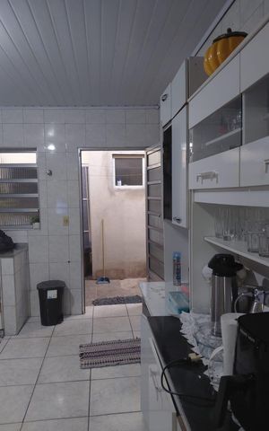 Casa à venda com 216m², 4 quartos e 3 vagas Casa à venda com 216m², 4 quartos e 3 vagasCozinha