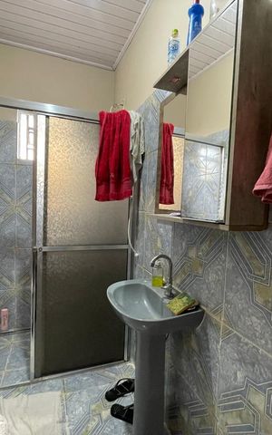 Casa à venda com 70m², 3 quartos e 1 vaga Casa à venda com 70m², 3 quartos e 1 vagaBanheiro