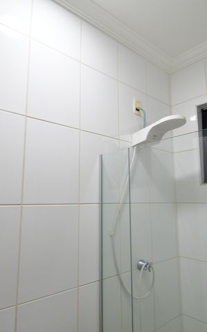 Casa de condomínio para alugar com 238m², 3 quartos e 4 vagasBanheiro de serviço