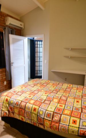 Casa de condomínio para alugar com 238m², 3 quartos e 4 vagasQuarto 1 - Suíte