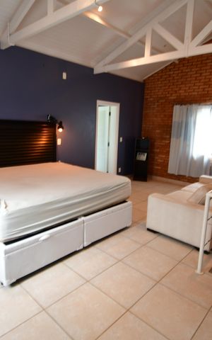Casa de condomínio para alugar com 238m², 3 quartos e 4 vagasQuarto 3 - Suíte