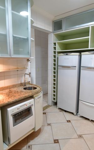 Casa de condomínio para alugar com 238m², 3 quartos e 4 vagasCozinha