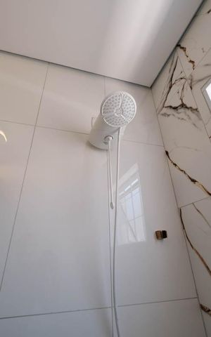 Casa à venda com 120m², 3 quartos e 2 vagasBanheiro