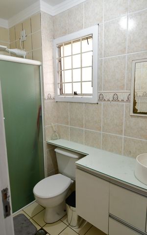 Casa de condomínio para alugar com 68m², 3 quartos e 1 vagaBanheiro