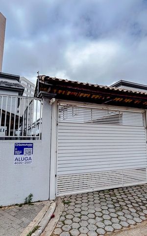 Casa de condomínio à venda com 57m², 2 quartos e 1 vagaFachada com Plaquinha