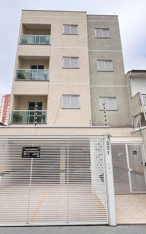 Apartamento à venda com 50m², 2 quartos e 1 vagaFachada + plaquinha