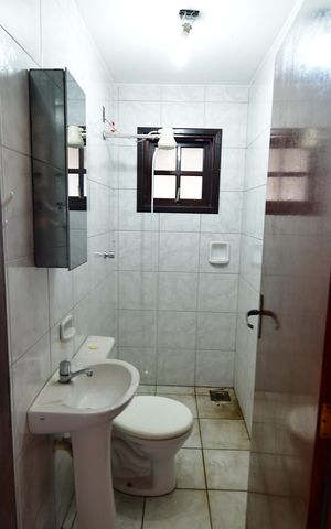 Casa à venda com 119m², 4 quartos e 2 vagasBanheiro de serviço