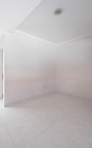 Casa de condomínio para alugar com 100m², 2 quartos e 2 vagasSala