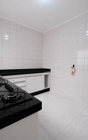 Casa de condomínio para alugar com 100m², 2 quartos e 2 vagasCozinha e Área de Serviço