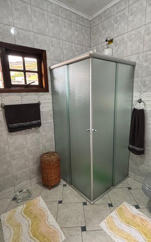Casa à venda com 390m², 4 quartos e 4 vagas Casa à venda com 390m², 4 quartos e 4 vagasBanheiro