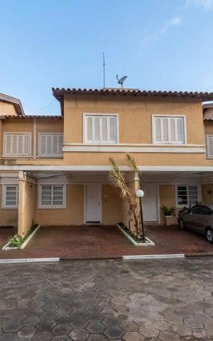 Casa de condomínio à venda com 98m², 3 quartos e 2 vagas Casa de condomínio à venda com 98m², 3 quartos e 2 vagasFachada
