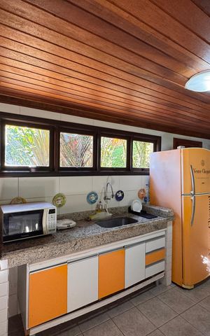 Casa de condomínio para alugar com 280m², 3 quartos e 2 vagasCozinha