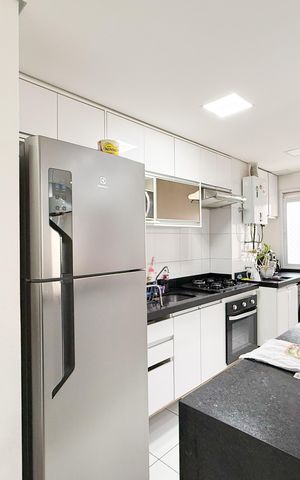 Apartamento à venda com 49m², 2 quartos e 1 vaga Apartamento à venda com 49m², 2 quartos e 1 vagaCozinha e Área de Serviço