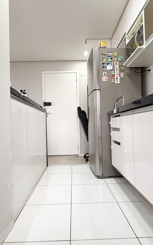 Apartamento à venda com 49m², 2 quartos e 1 vaga Apartamento à venda com 49m², 2 quartos e 1 vagaCozinha e Área de Serviço